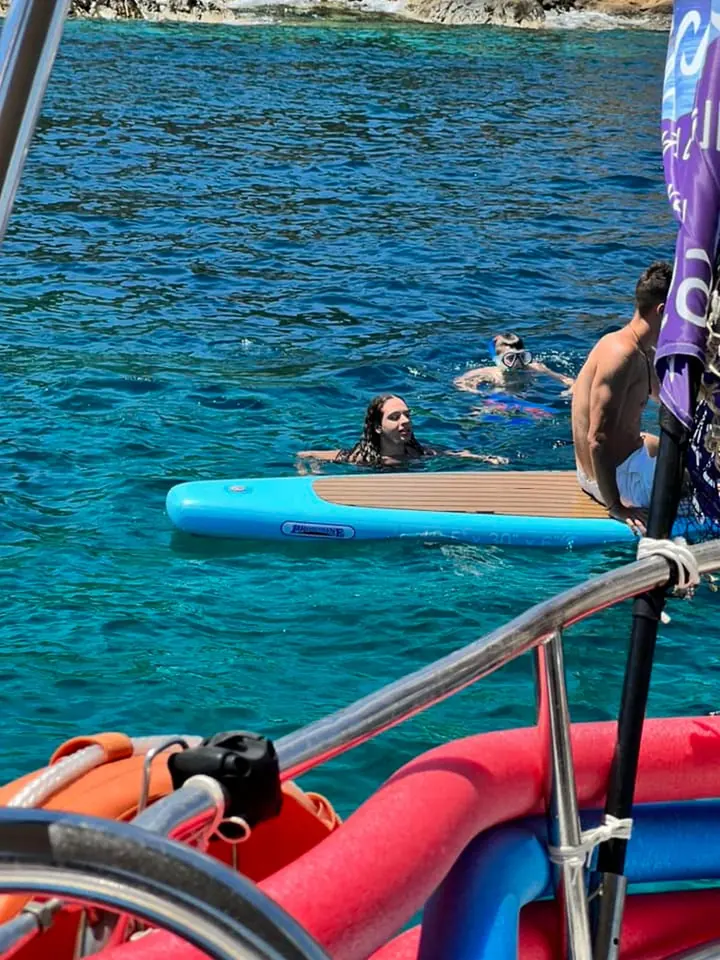 A swim beside the SUP board